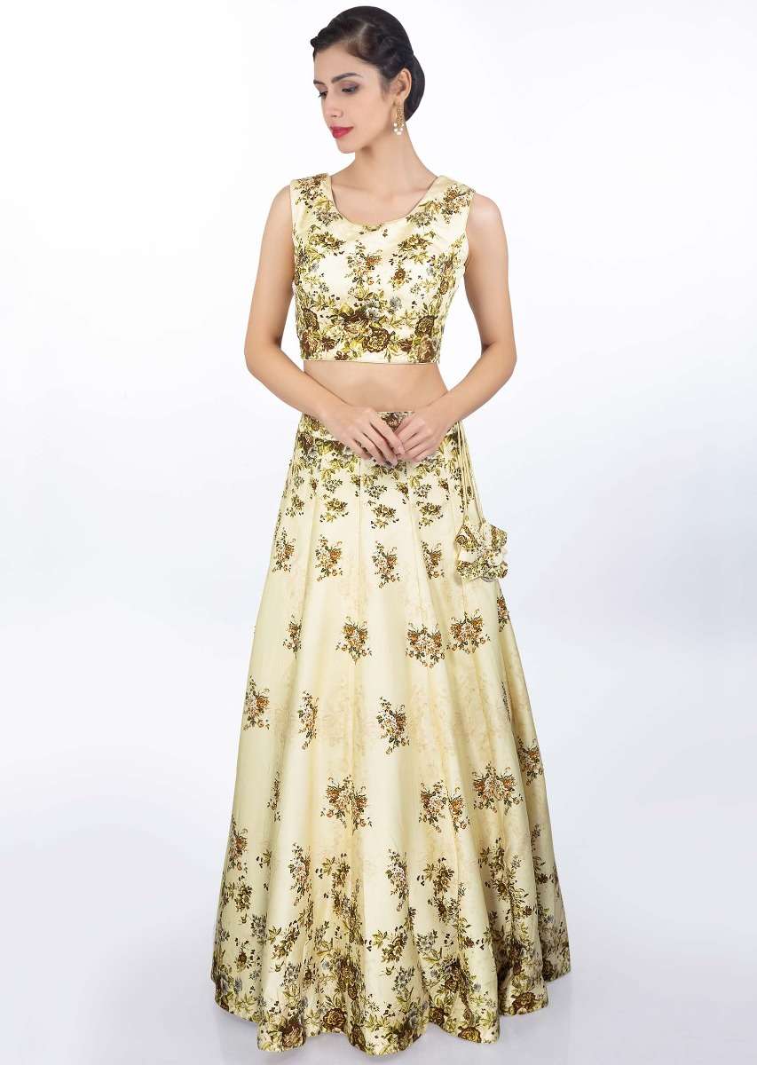 Cream satin crepe lehenga and blouse in digital floral print with matching net dupatta
