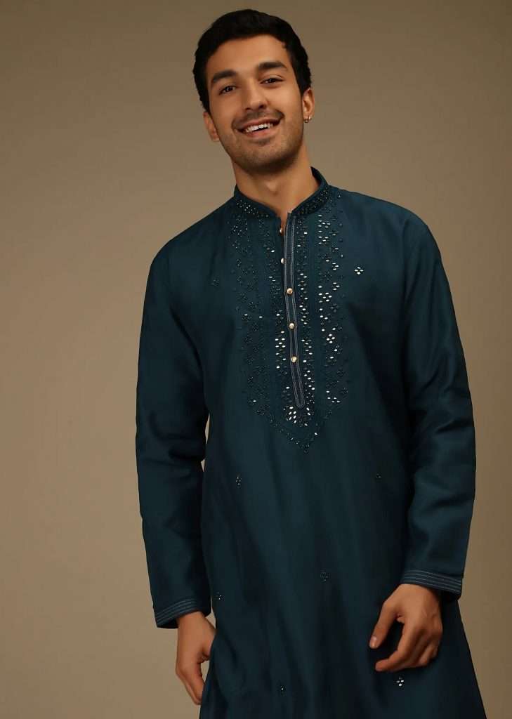 A man wearing Prussian blue kurta set in silk with silk and mirror abla embroidered yoke design