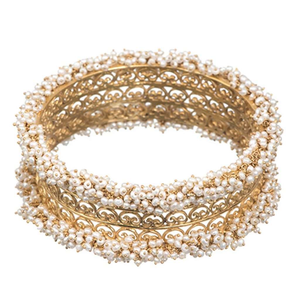 Gold Plated Bangle With Carved Filigree Design And Pearls By Zariin