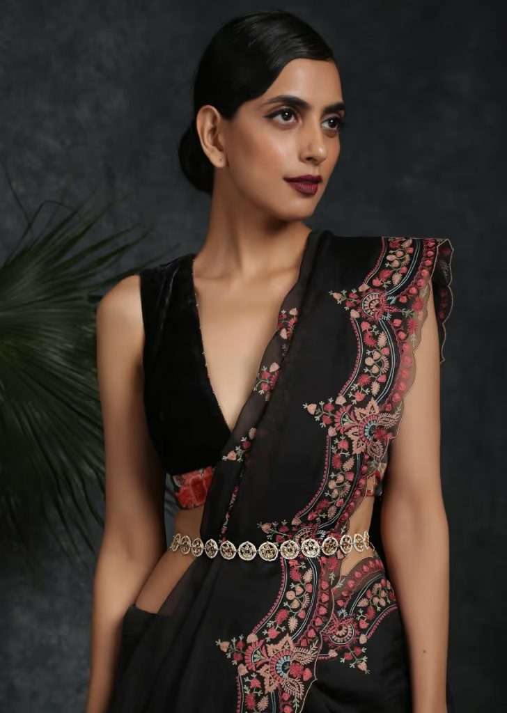 A Women Posing for Photo Wearing Gold Plated Waist Belt Enhanced With Timeless Polki Combined With High Grade Shell Pearls By Paisley Pop
