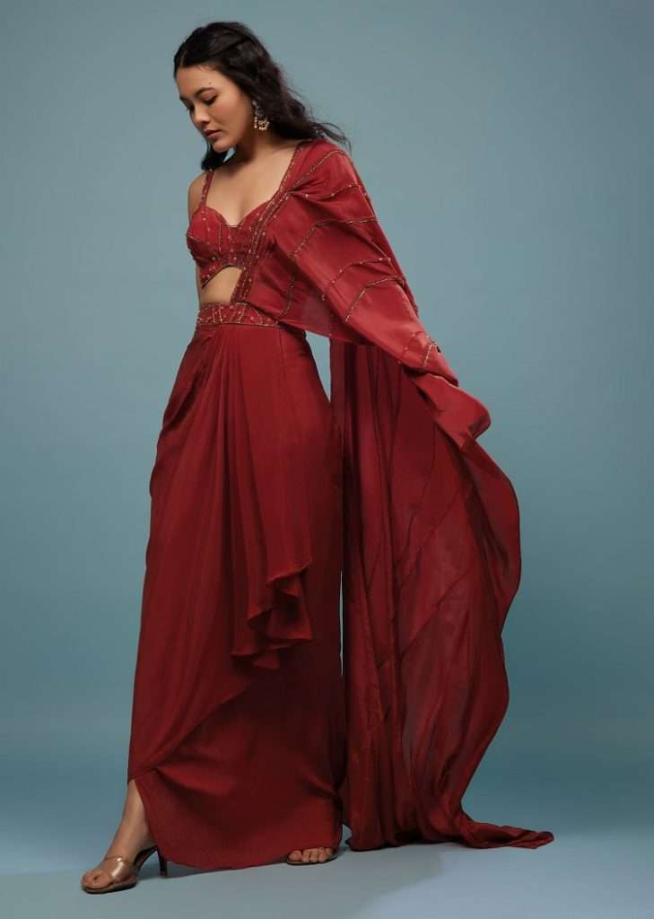 Women poses in Blood Red Ready-Pleated Embroidered Saree