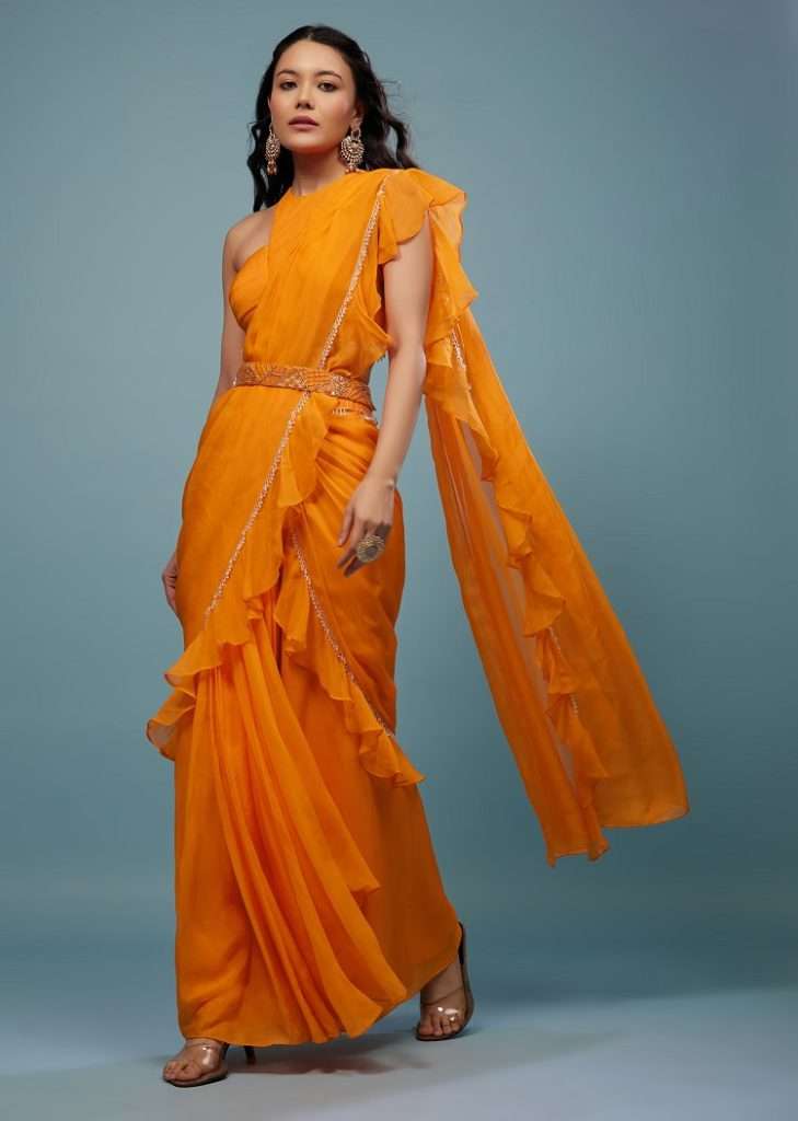Women poses in Carrot Orange Ready-Pleated Saree With Frill Pallu