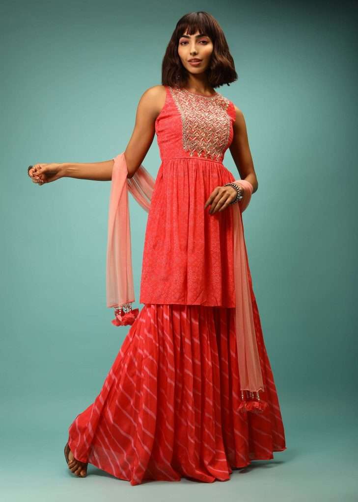 Fuchsia Peplum Sharara Suit With Bandhani And Lehariya Print And Adorned In Resham And Mirror Embroidery In Floral Design