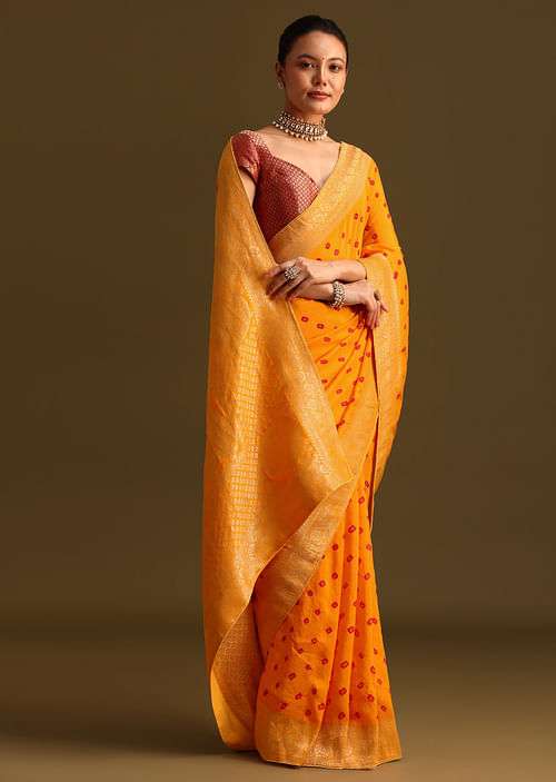 Dola Silk Bandhani Mustard Saree With Contrast Brocade Unstitched Blouse
