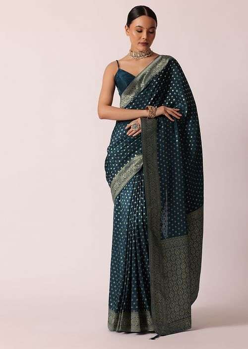 Teal Dola Silk Saree With Woven Zari Pallu And Unstitched Blouse Piece

