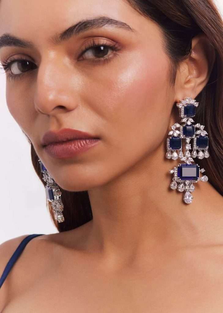 White Finish Zircon And Blue Stone Dangler Earrings

