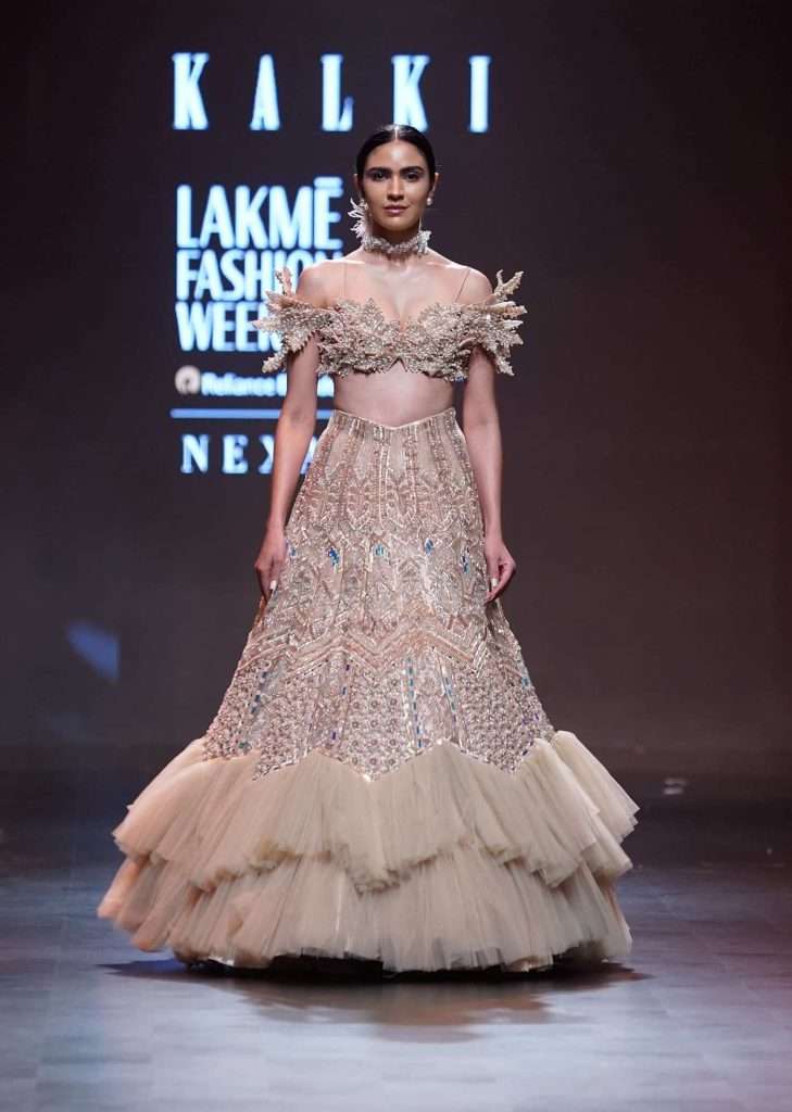 Gold Off Shoulder Blouse And Layered Skirt Set With Patchwork Embroidery

