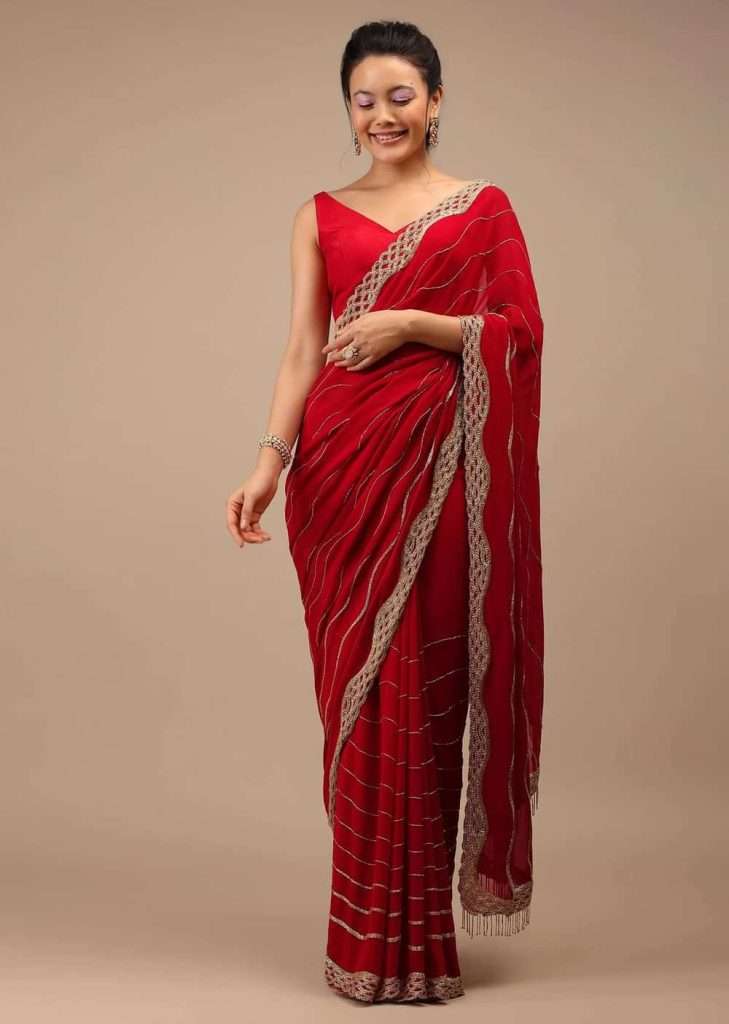 Lipstick Red Georgette Saree Adorned With Golden Zardozi Embroidery & Detailing, And Cut Dana Fringes
