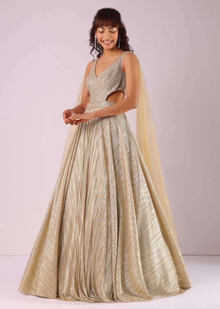 Glam Gold Embroidered Gown In Knit Fabric With Net Trail Wings

