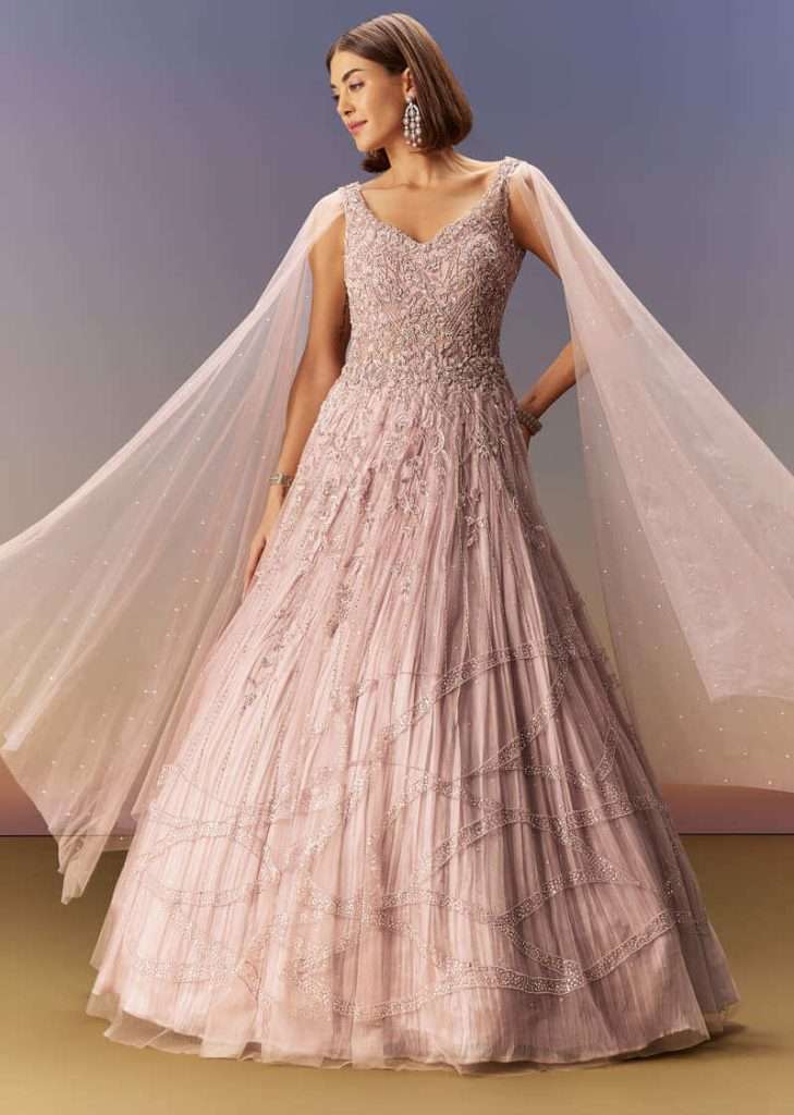 Pastel Pink Gown With Embellished Shoulder Cape Trails