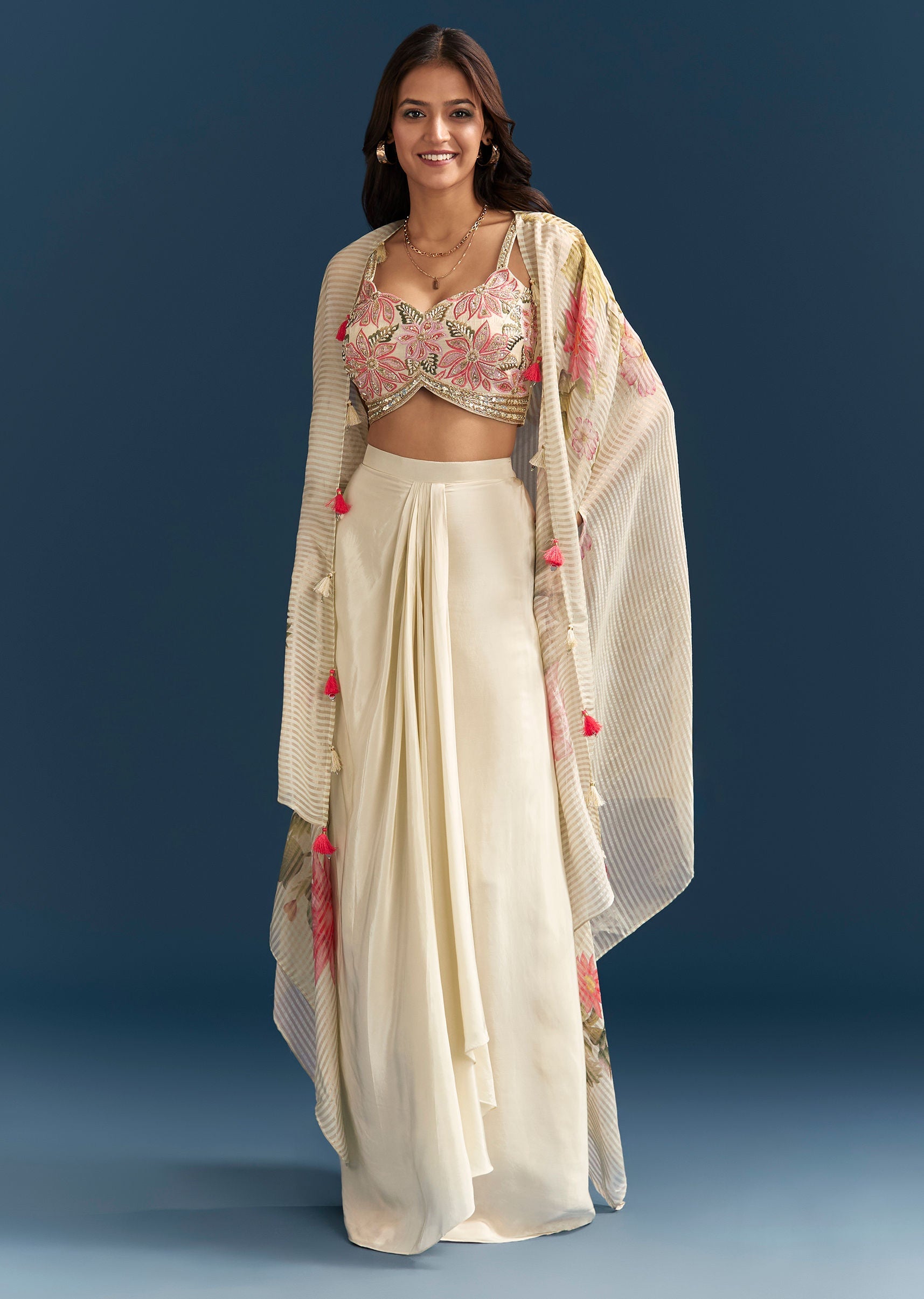 Beige Crop Top Skirt Set With Resham Work And Floral Cape