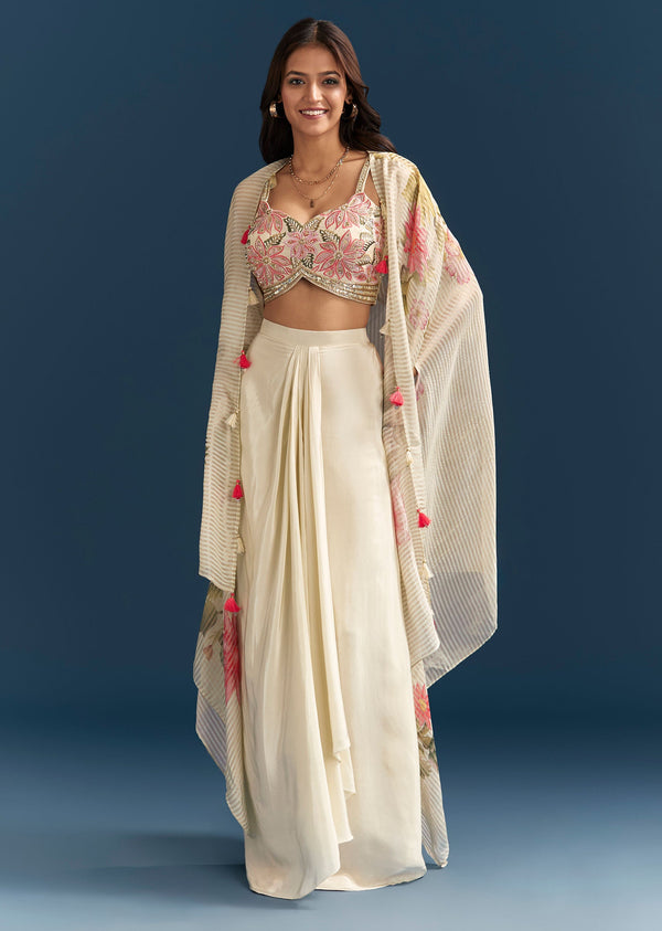 Beige Crop Top Skirt Set With Resham Work And Floral Cape