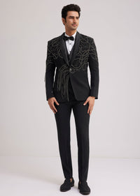 Black Suiting Tuxedo With Metallic Chain And Stone Work