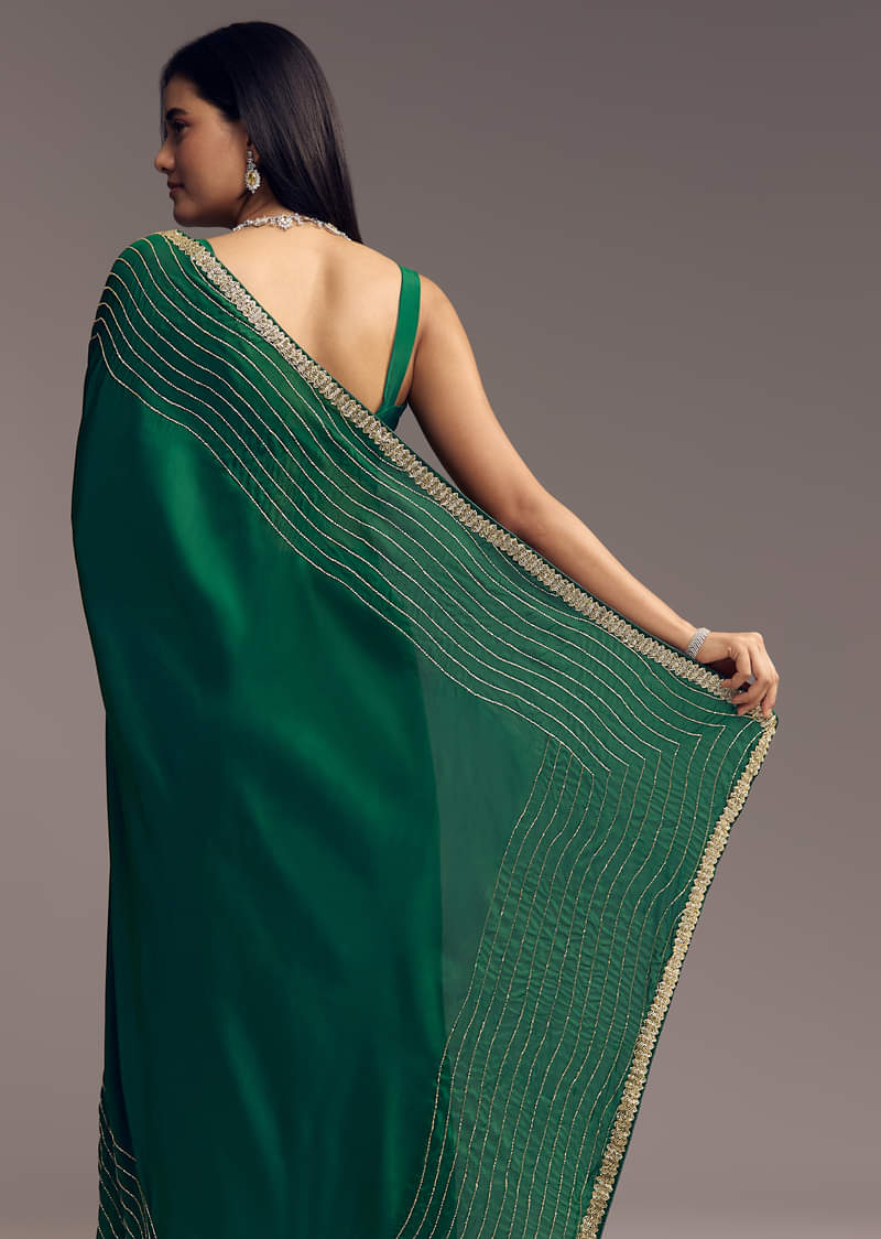 Bottle Green Organza Saree With Scalloped Cut Dana Detailing