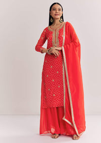 Bright Orange Bandhani Kurta Palazzo Suit With Sequins And Zardosi Work