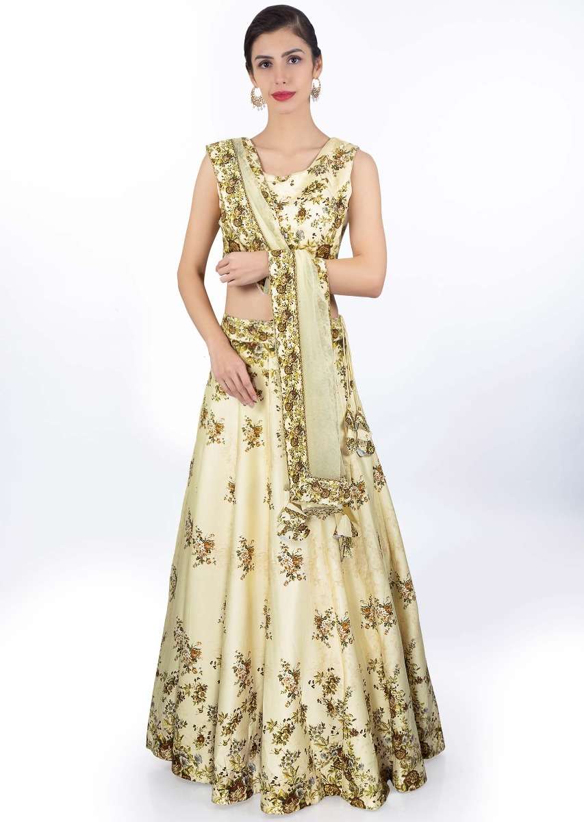 Cream satin crepe lehenga and blouse in digital floral print with matching net dupatta