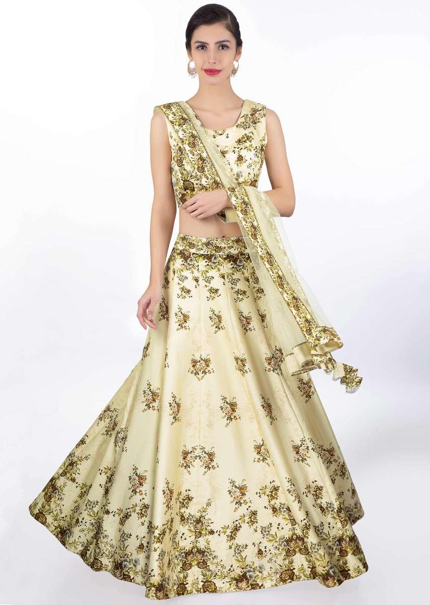 Cream satin crepe lehenga and blouse in digital floral print with matching net dupatta