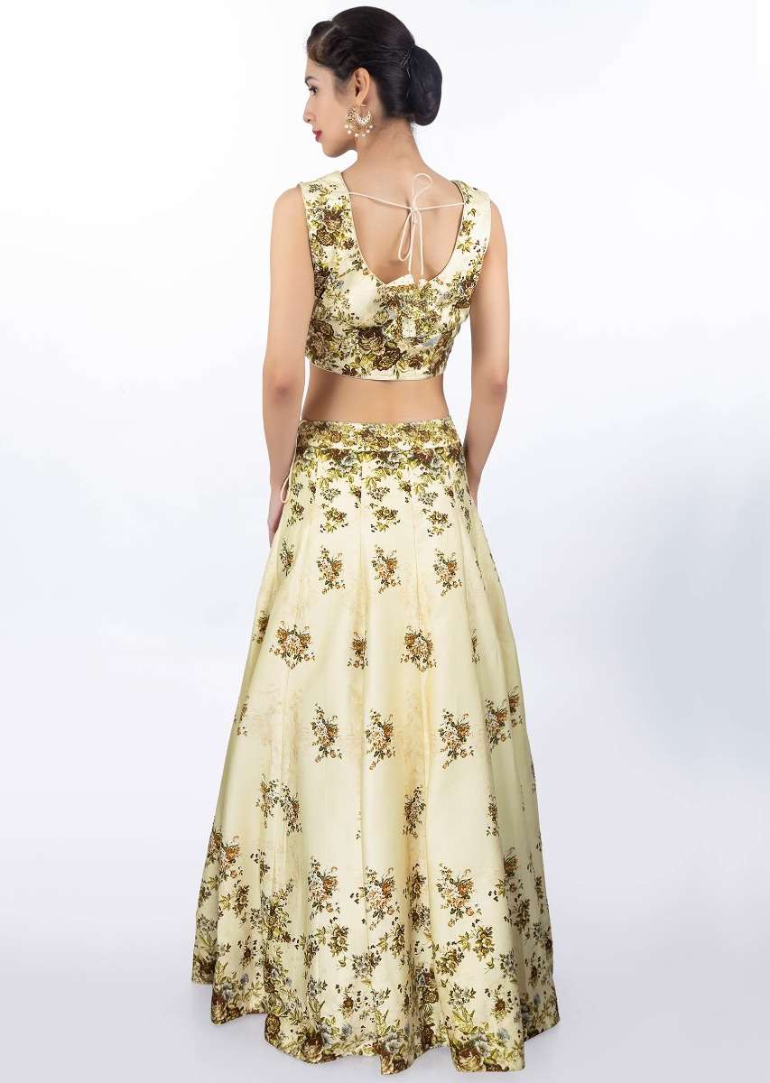 Cream satin crepe lehenga and blouse in digital floral print with matching net dupatta