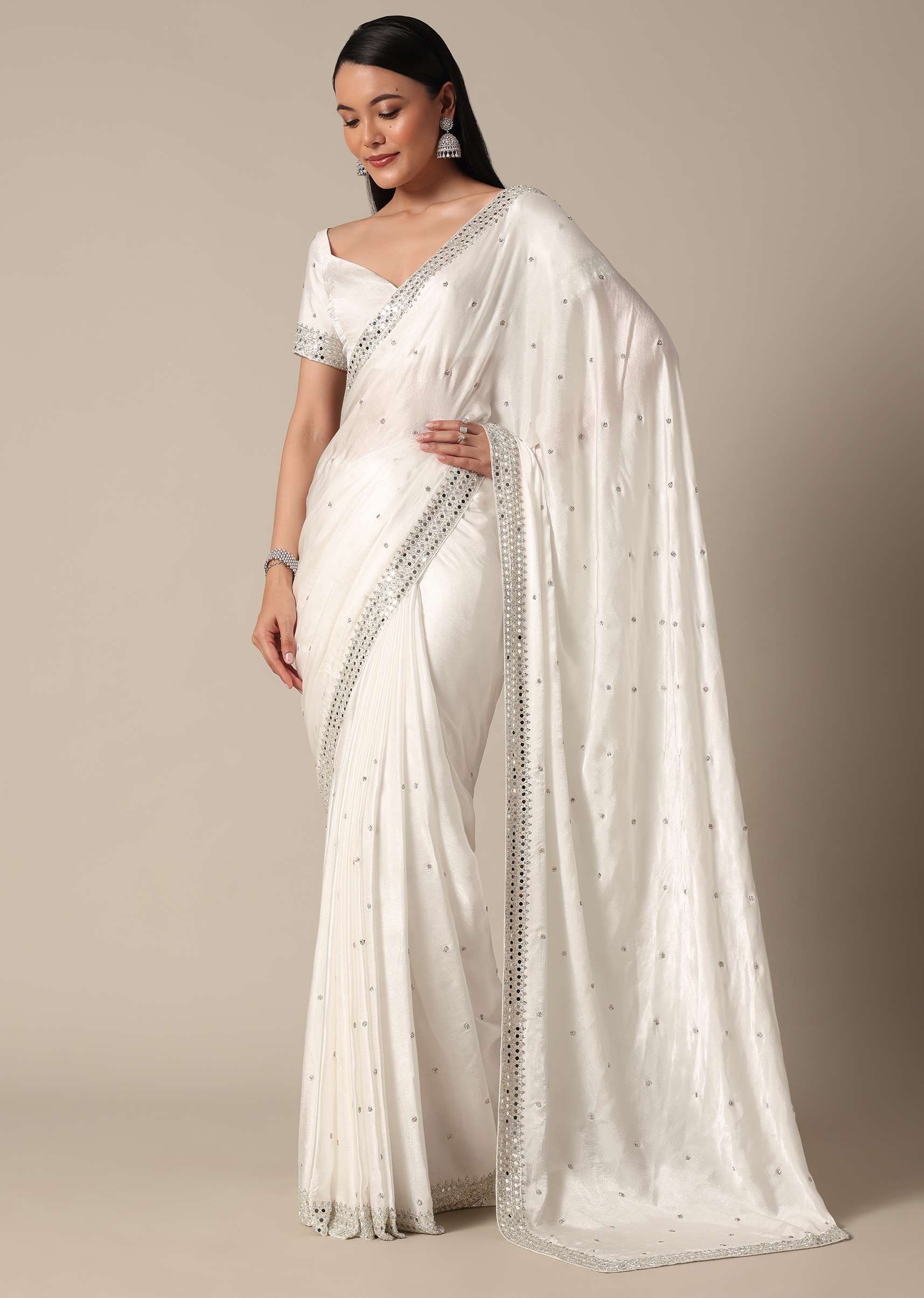 Glamorous White Chinnon Saree With Stone Embellishments