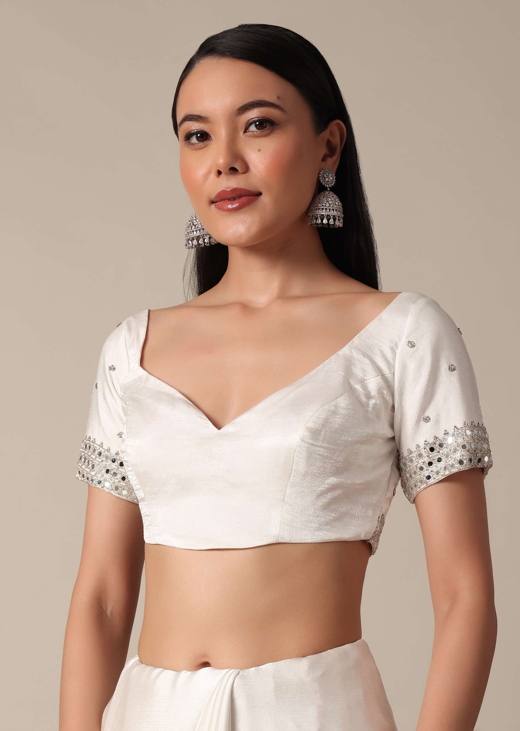 Glamorous White Chinnon Saree With Stone Embellishments