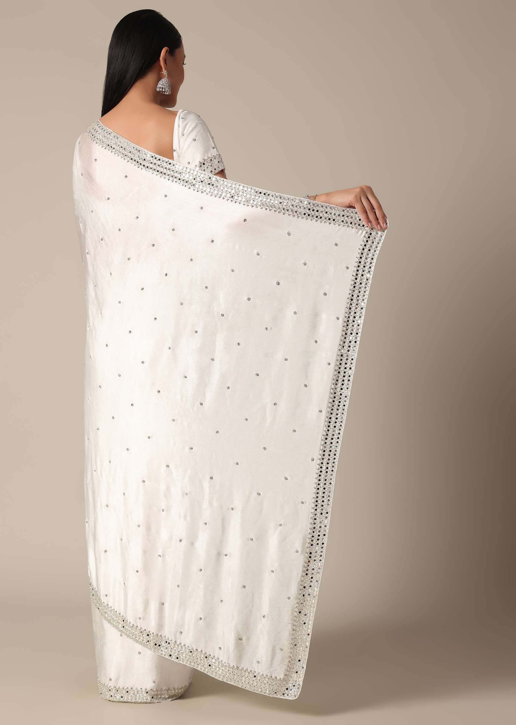 Glamorous White Chinnon Saree With Stone Embellishments