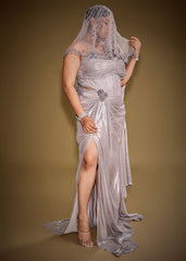 Gold One Shoulder Drape Gown With Embroidered Floral Brooch And Trail