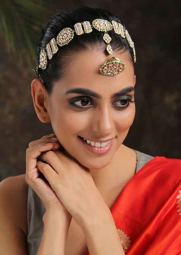 Gold Plated Mathapatti With Kundan And Moti In Unique Floral Motifs And A Round Borla Shaped Tikka In The Centre By Paisley Pop