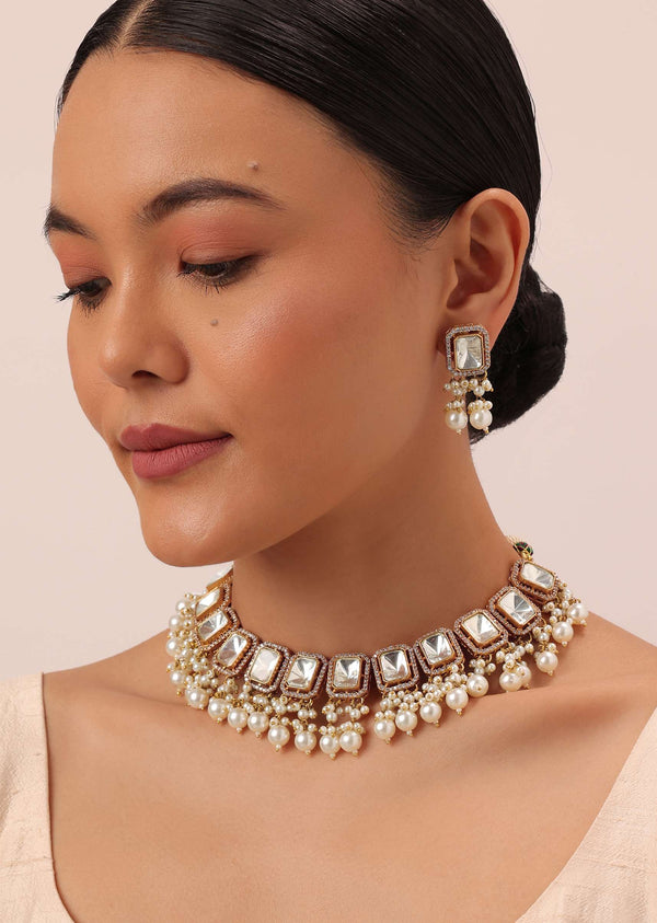 Gold Finish Kundan Necklace Set With Pearl Drops And Geometric Motifs