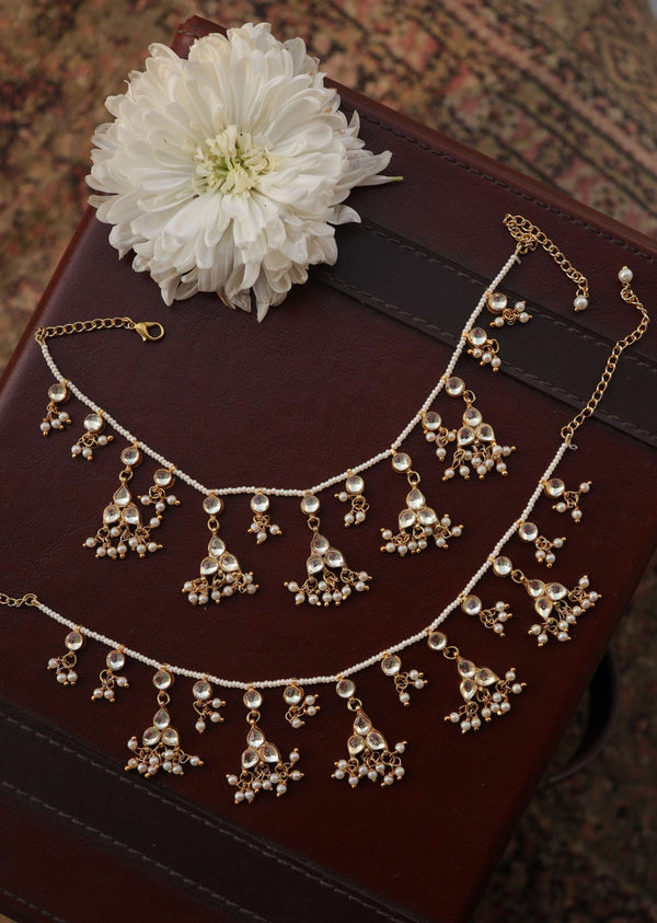 Gold Plated Kundan Anklets With Shell Pearls In Silver Alloy