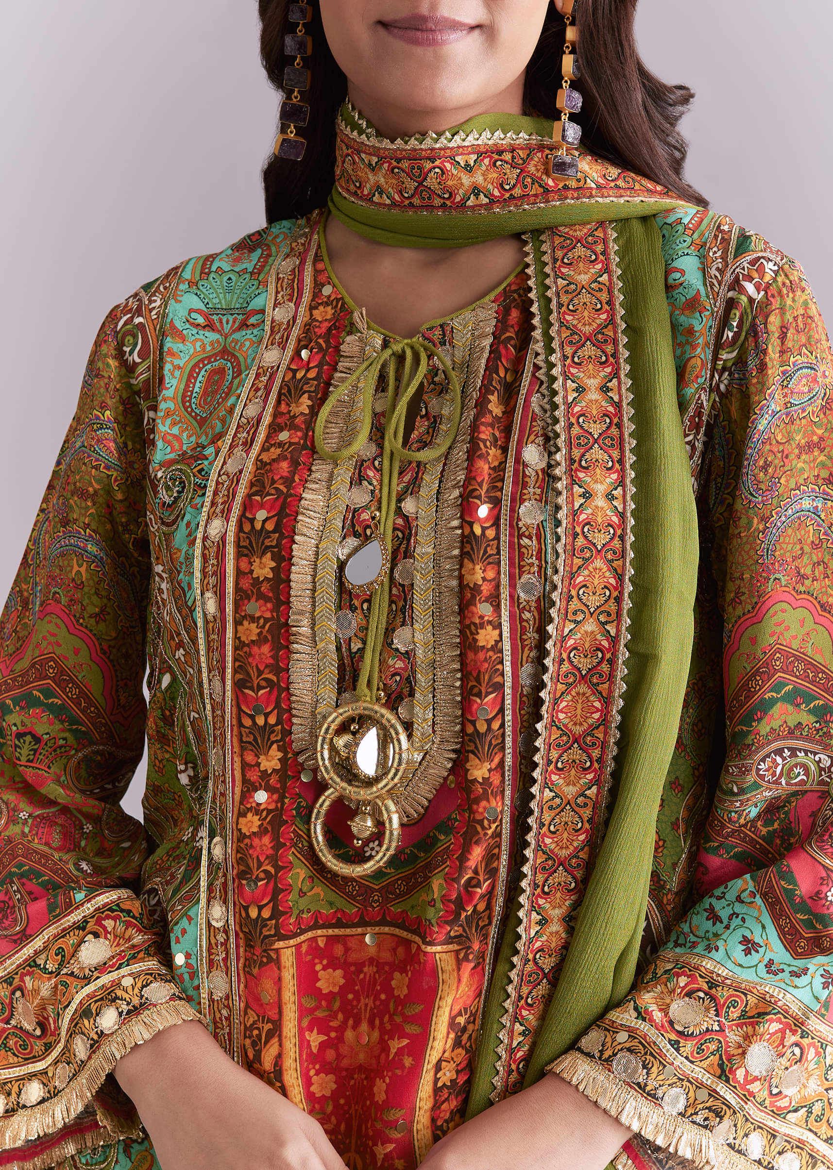 Green Crepe Printed Sharara Suit With Gota Detail And Potli