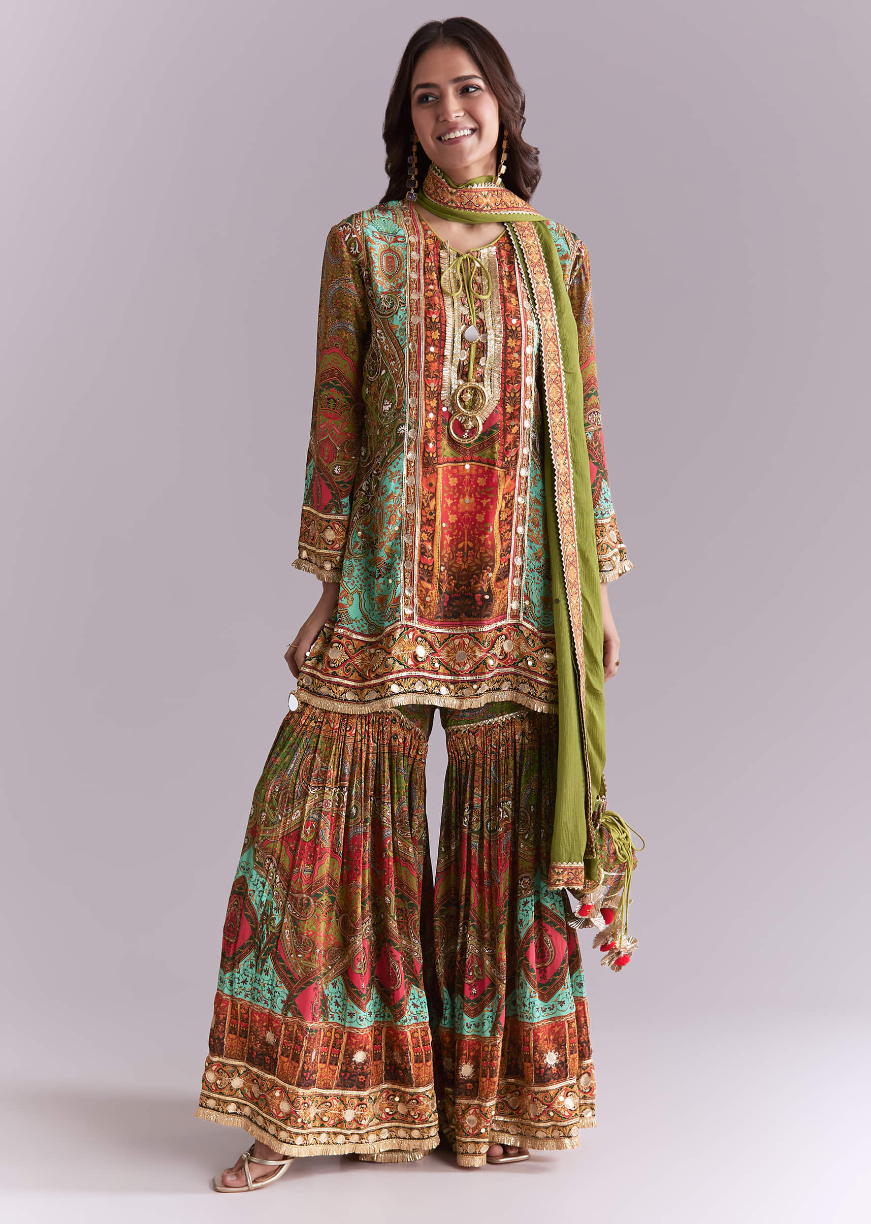 Green Crepe Printed Sharara Suit With Gota Detail And Potli