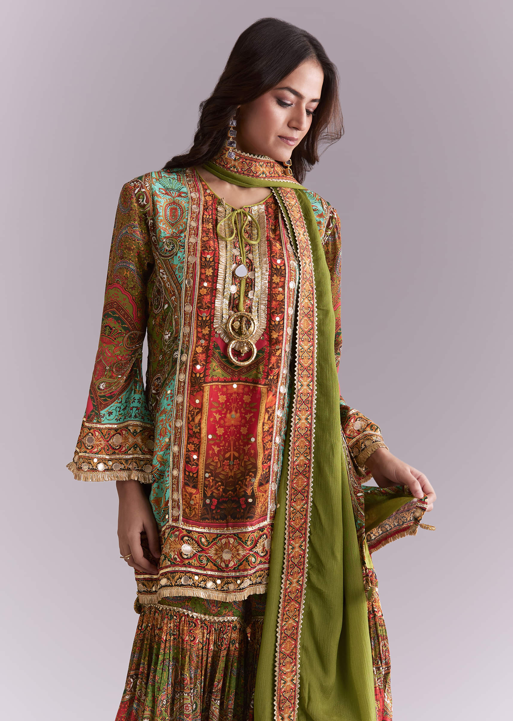 Green Crepe Printed Sharara Suit With Gota Detail And Potli