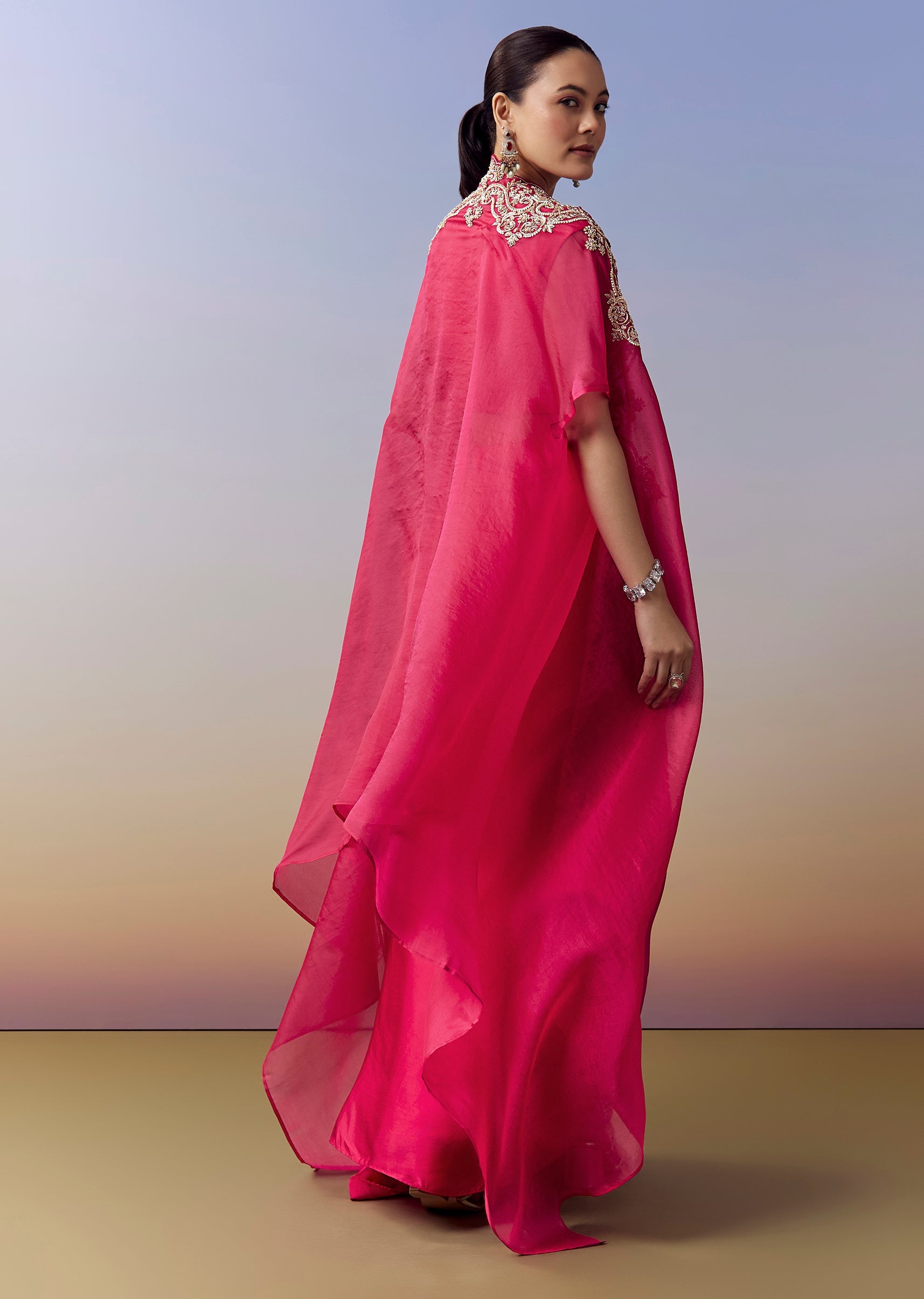 Hot Pink Indo Western Crop Top Skirt Set With Zardosi Work And Organza Cape Hot Pink Indo Western Crop Top Skirt Set With Zardosi Work And Organza Cape