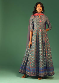 Hunter Green Anarkali Suit In Raw Silk With Patola Print And Kundan Detailing Along With A Pink Net Dupatta