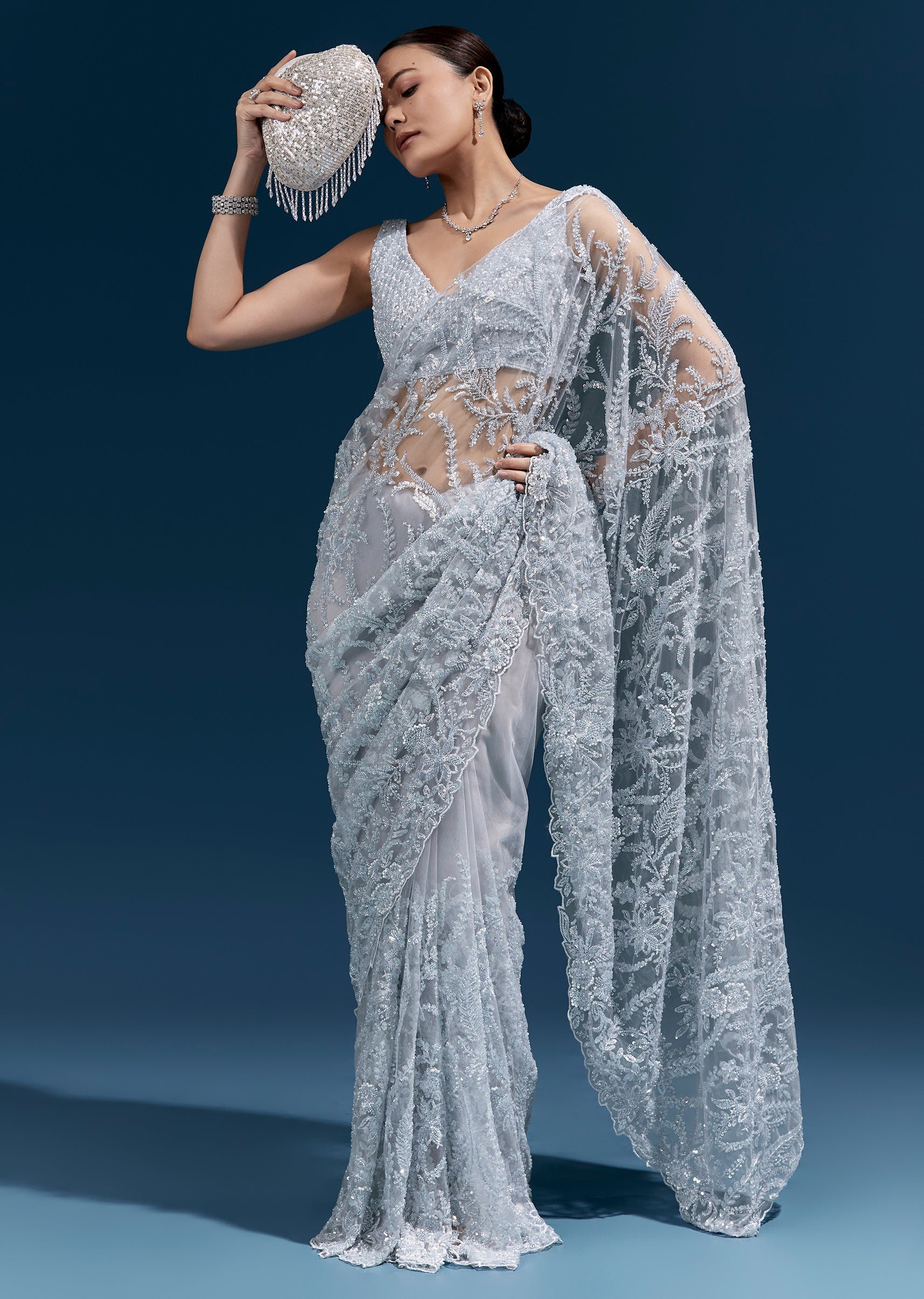 Ice Blue Heavy Embroidered Net Saree With Cutwork Border And All Over Floral Jaal