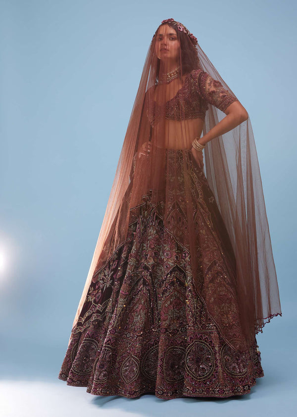 Chocolate Brown Archetypal Lehenga In Velvet Raw Silk With Heavy Embroidery And Trail - NOOR 2022