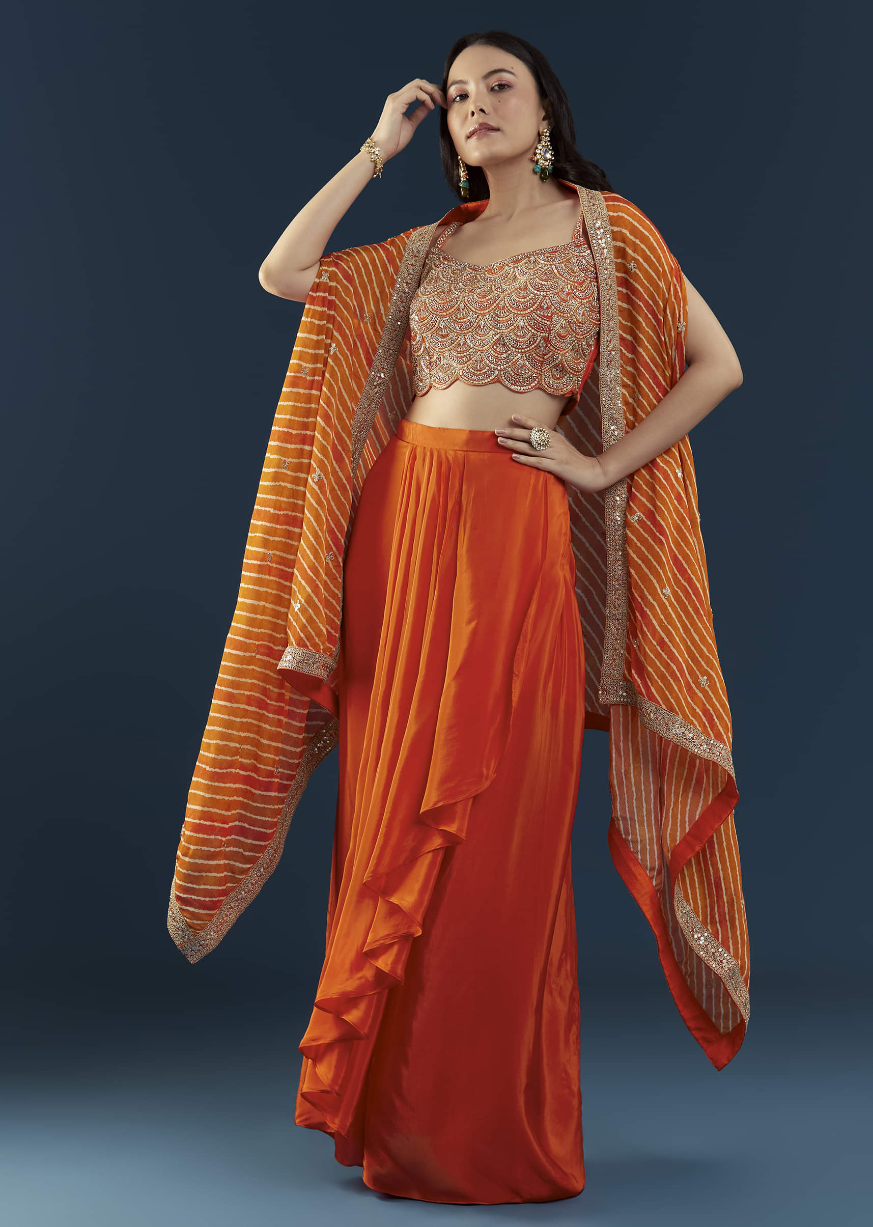 Orange Asymmetric Crop Top Skirt Set with Leheriya Cape