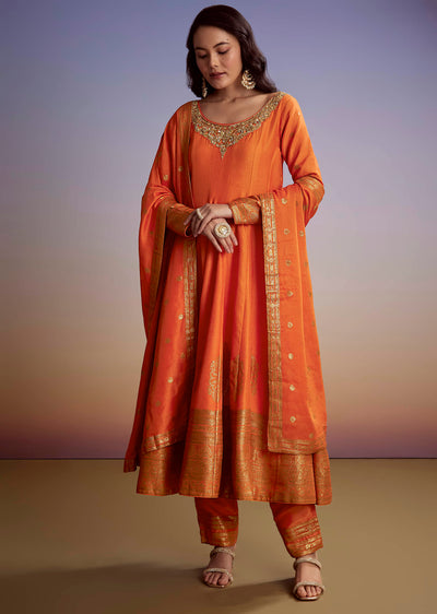 Orange Silk Anarkali Suit With Heavy Embroidery And Weave Border